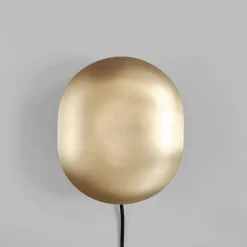 Clam vägglampa brass
