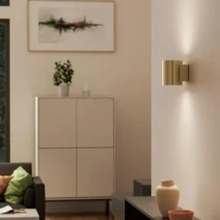 Evoke S vägglampa IP44 satin mässing
