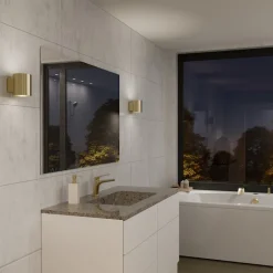 Evoke S vägglampa IP44 satin mässing