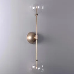 Miron vägglampa mässing